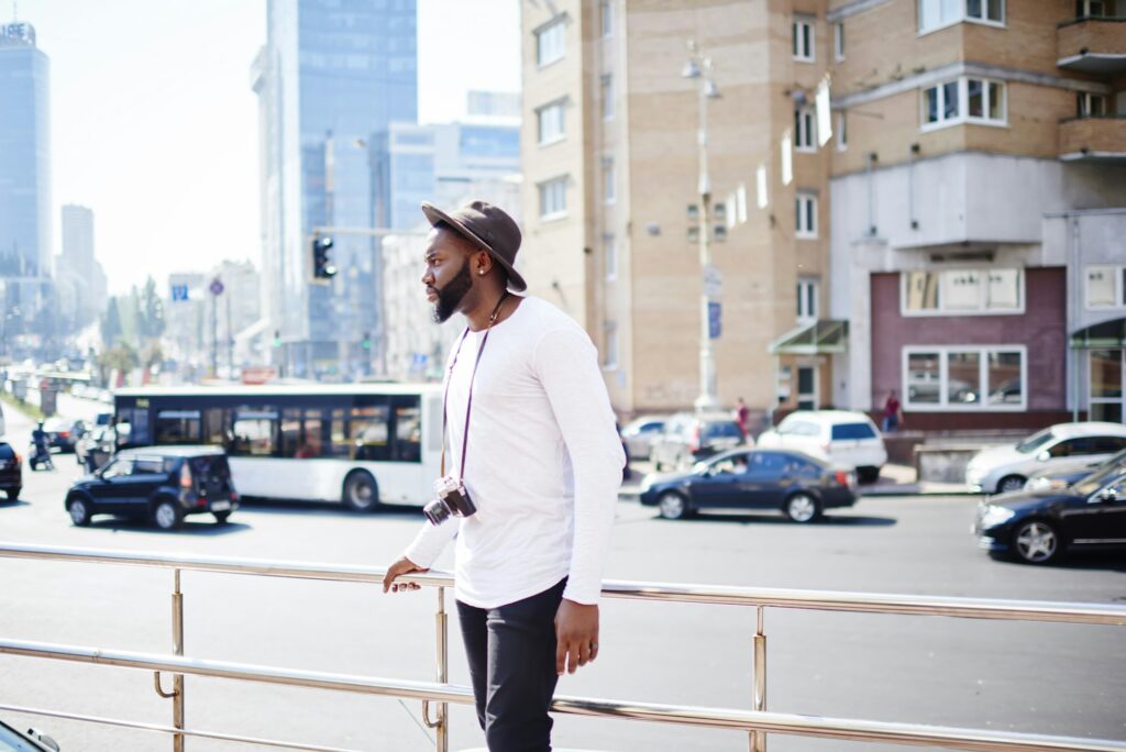 African American man in hat travelling