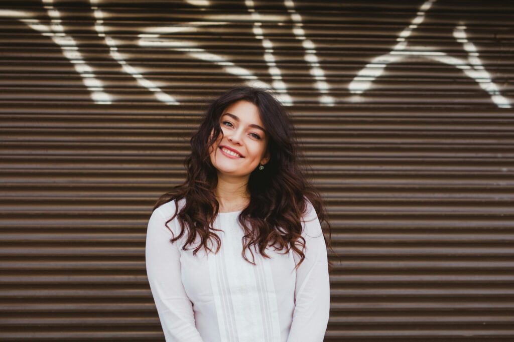 Pretty plus size woman smiling with perfect smile